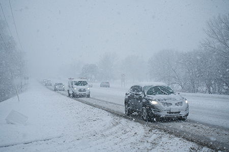 Cars driving during whiteout conditions