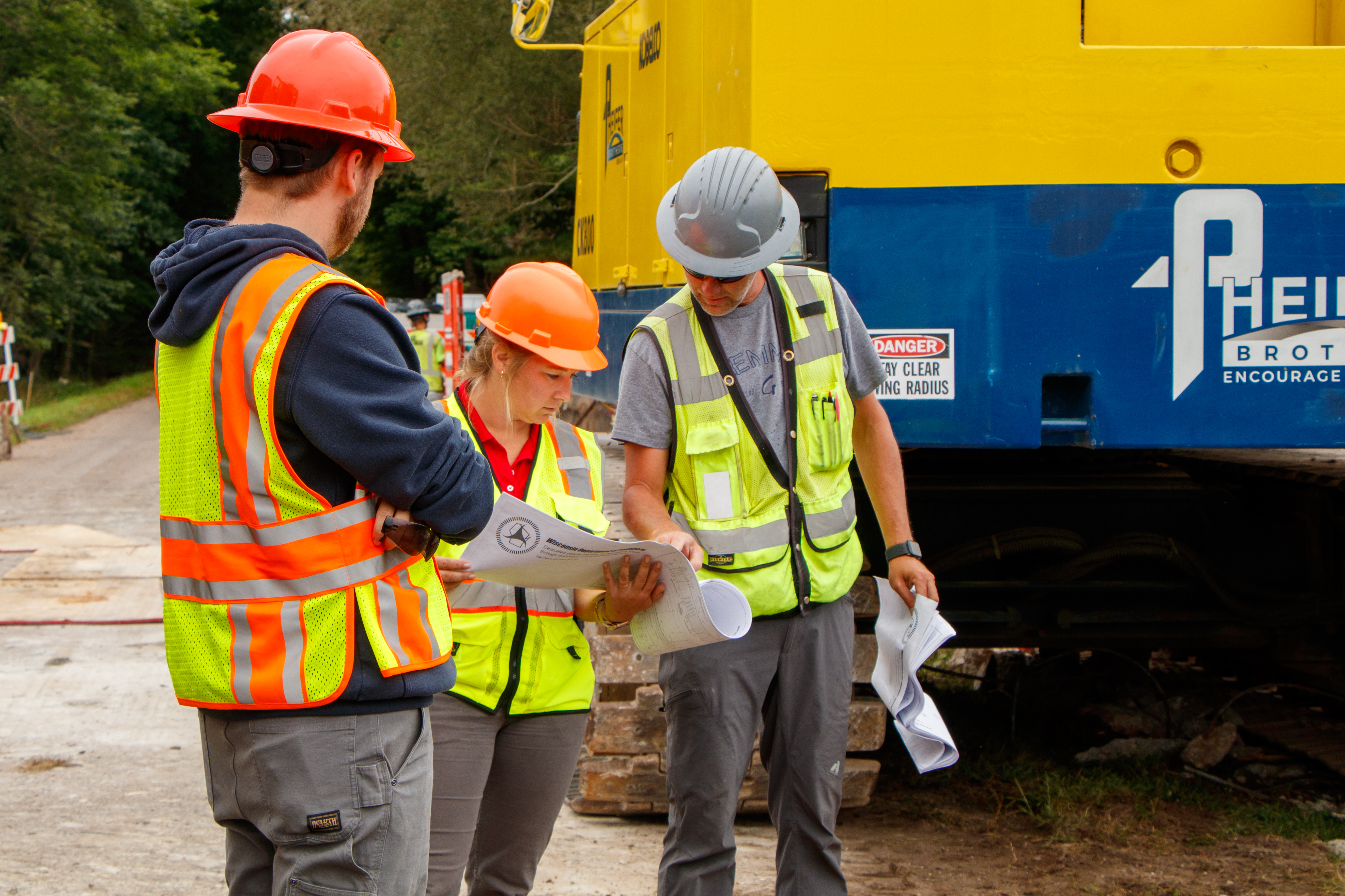 Engineers reviewing plans