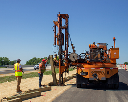 A certified DBE installs guardrail for the WIS 36 Burlington Bypass