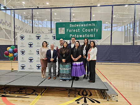 Members of Forest County Potawatomi and WisDOT representatives at the sign unveiling