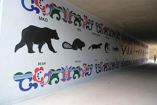 Mural on the wall at a multi-use path under US 8.