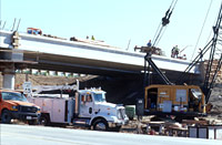 Construction equipment under bridge