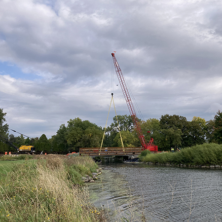 Construction of a pedestrian bridge over a creek
