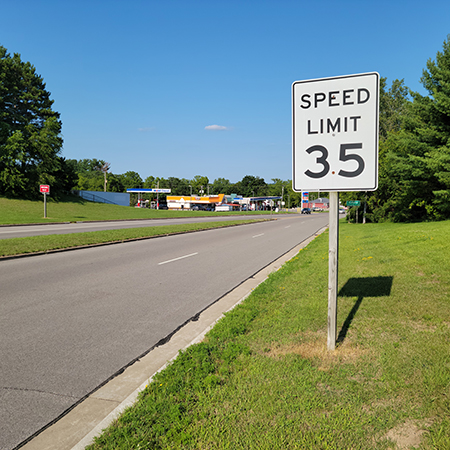 Traffic on a statehighway, viewed from the top of a hill