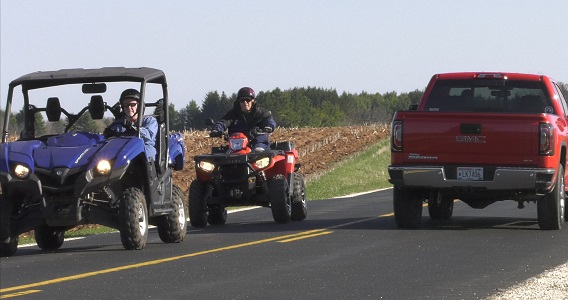 ATV and UTV on a road