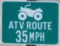 Improper combination ATV route and speed limit sign