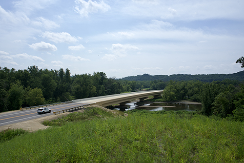 Car driving over the WIS 130 bridge in Lone Rock.