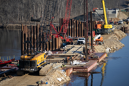 Construction workers at work on the WIS 130 design-build project.