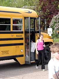 School bus with children exiting